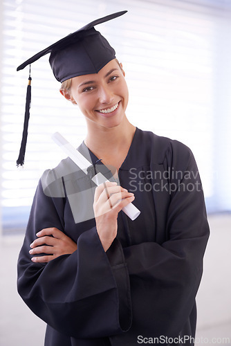 Image of Graduate, diploma and portrait of happy woman with confidence at university. Face, certificate and student with arms crossed for graduation, education and achievement of success at college in Canada