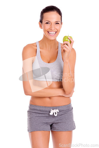 Image of Health, apple and portrait of woman in studio with snack for weight loss, fitness and wellness diet. Smile, vitamins and female person eating organic, fresh and nutrition fruit by white background.