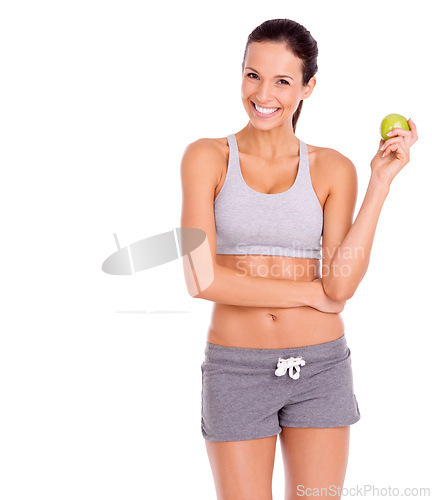 Image of Happy, apple and portrait of woman in studio with snack for weight loss, health and wellness diet. Smile, nutrition and young female person eating organic and fresh fruit by white background.