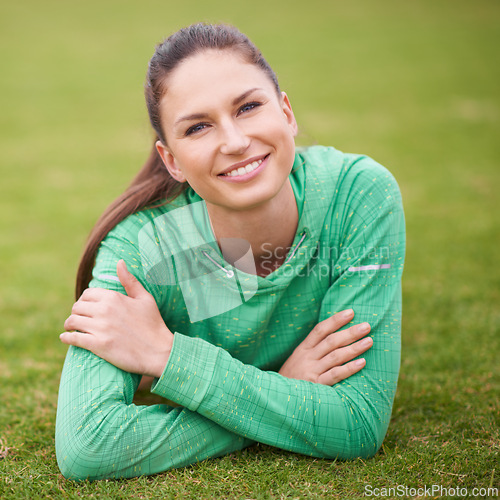 Image of Smile, sports and portrait of woman on grass for fitness, exercise and workout for wellness. Athlete, happy and face of female person in nature for training, health and laying in park outdoors