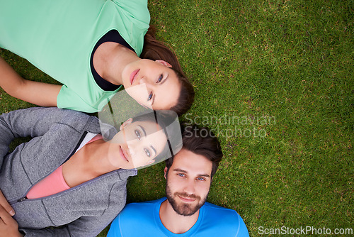 Image of Top view, group of people on grass and portrait for fitness, relax after workout for health and wellness together. Exercise, training club for sports and active in nature, support and trust outdoor