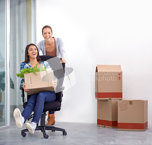 Image of New office, business people and boxes with portrait, excited and achievement with venture or startup. Women, staff or coworkers with cardboard or play with partnership or professional development