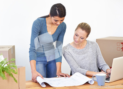 Image of Woman, laptop and boxes for moving into office for small business, start up and paper for designing. Female entrepreneurs, blueprints and technology for planning, organizing and architecture company