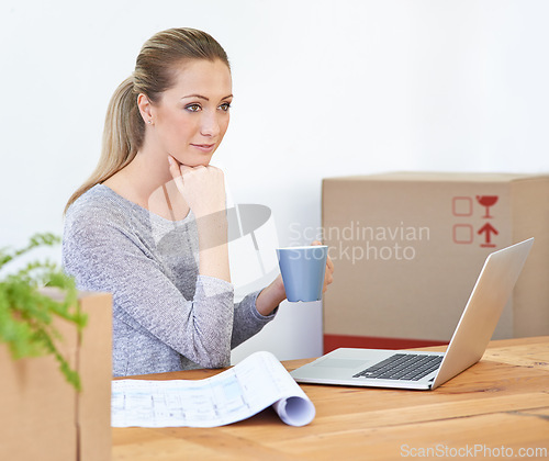 Image of Coffee, thinking and woman with a laptop, boxes and smile with decision, documents and startup. Person, employee and entrepreneur with computer or tech with courier or ideas with planning or choice