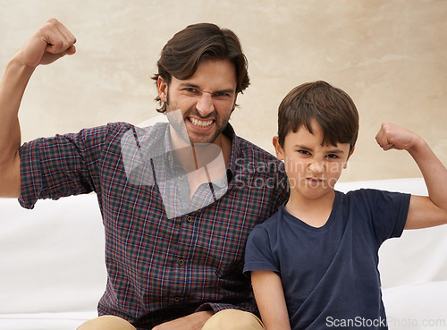 Image of Sofa, muscle and portrait of father and child flex for bonding, fun childhood and relax together. Family, home and strong dad with young son on couch for love, care and support in living room