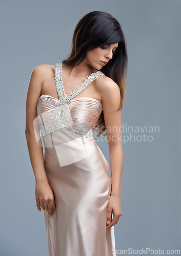 Image of Fashion, luxury and woman with elegant dress, confidence and girl with pride in studio. Classic, glamour and vintage chic style with model on grey background for designer clothes, silk and aesthetic.