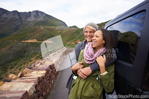 Image of Happy couple, hug and road trip with love for bonding, holiday or weekend together by car in nature. Young man and woman with smile enjoying romance in support, trust for outdoor vacation by vehicle