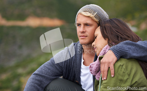 Image of Couple, hug and relax with love for bonding, holiday or weekend together in peaceful nature. Calm young man and woman resting head on shoulder for embrace, support or care in trust or outdoor romance