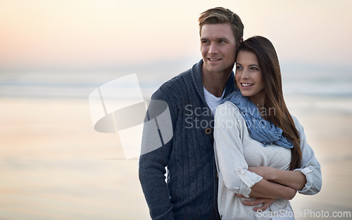 Image of Couple, thinking and hug with love outdoor at sunset planning future holiday together in Florida. Travel, ideas and man with woman on beach, vacation or date in summer with support in marriage