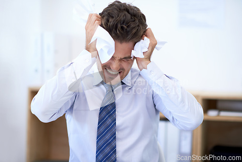 Image of Businessman, head and debt with crumpled paper, burnout and mistake for frustration, stressed and headache. Angry employee, worker and report for bills, worried and failure with audit or deadline