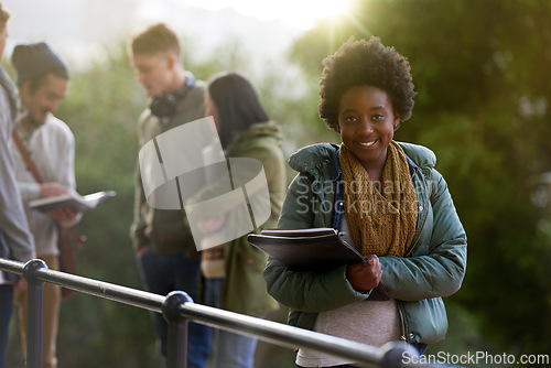 Image of Student, black woman and portrait with books on campus, education and learning material for studying. Happy, scholarship and university for academic growth, textbook or notebook with knowledge