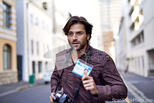 Image of Photographer, journalist and news with man in city for running, press badge and paparazzi. Reporter, story and pictures with person and camera in urban outdoors for announcement and investigation