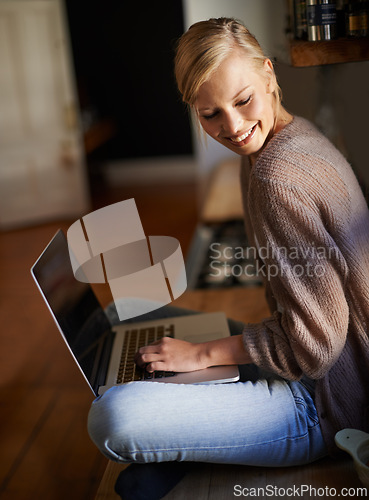 Image of Remote work, laptop and happy woman in a house for research, planning or web communication. Freelance, smile and female person in living room with social media, blog or copywriting, project or task