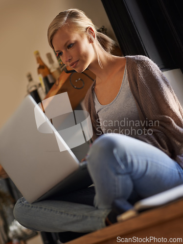 Image of Laptop, search and woman relax in a house with social media, streaming or watching movies. Pc, subscription and female person chilling at home with online entertainment, ebook or video, film or show