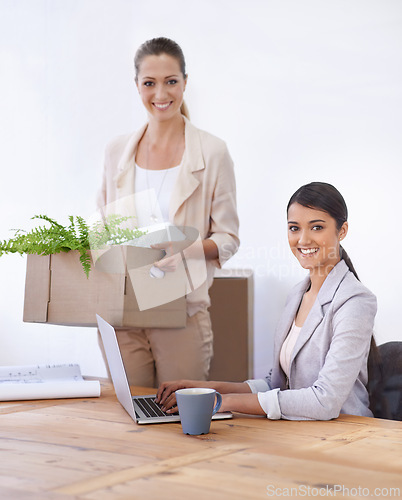 Image of Portrait, women and moving to office with laptop, smile and opportunity for entrepreneurship together. Computer, startup and business people with box for relocation, new workplace and partnership.