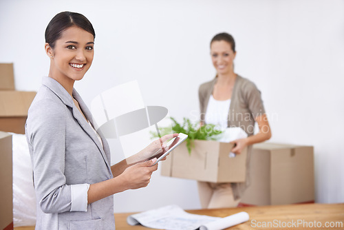 Image of Portrait, women and moving to office with smile, tablet and opportunity for entrepreneurship together. Computer, startup and business people with box for relocation, new workplace and partnership.