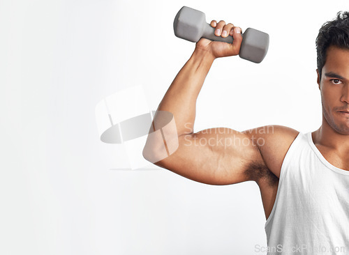 Image of Gym, mockup and portrait of man with dumbbell in studio for weightlifting, sports or resilience on white background. Half, face or guy bodybuilder with space for power, performance or bicep challenge