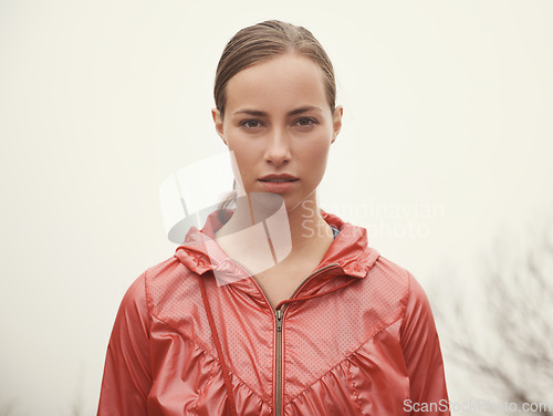 Image of Woman, portrait and fitness outdoor with fog for hiking, exercise and workout in nature with confidence. Athlete, person and face with pride for running, training and sportswear for healthy body