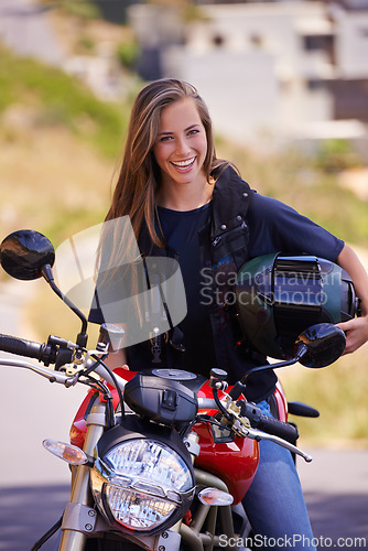 Image of Portrait, smile and outdoor with woman, motorbike and extreme sports with helmet and safety. Face, person and girl with transport and travel with adventure and journey with rider, joyful or road trip