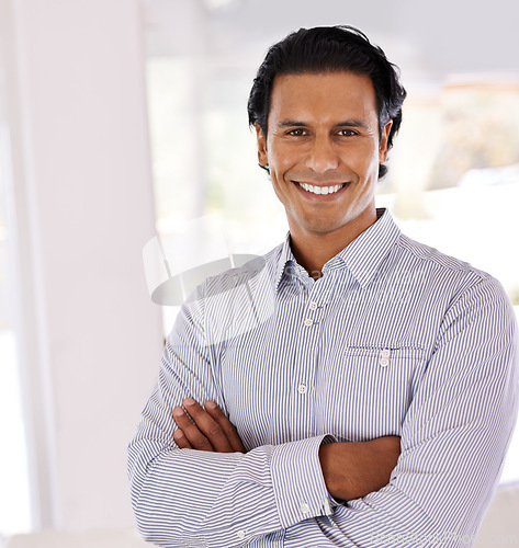 Image of Portrait, smile and business man with arms crossed in home for job or career of employee in Brazil. Face, happy professional and confident entrepreneur, realtor or real estate agent working in house