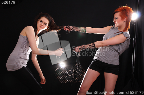 Image of Two models in colorful setting in the studio