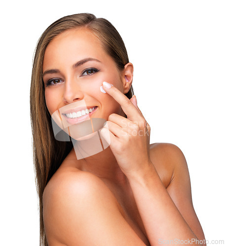Image of Woman, portrait and finger with lotion application in studio or facial treatment as dermatology, skincare or makeup. Female person, face and cream product for health, mockup space or white background