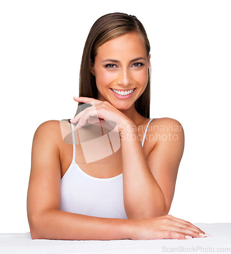Image of Portrait, skincare and happy woman on table for wellness or health isolated on a white studio background. Face, cosmetics and smile of model on desk in spa for facial makeup, beauty and aesthetic