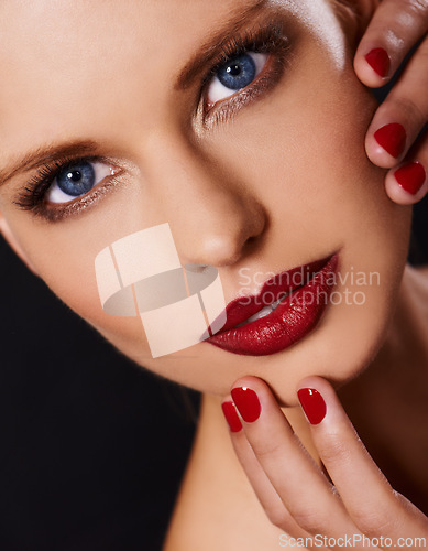 Image of Portrait, makeup and manicure with woman isolated on dark background for cosmetics or satisfaction. Salon, red lipstick and nail polish with confident young model in studio for beauty or wellness