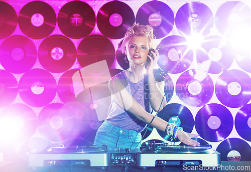 Image of Portrait, music and woman dj with mixer on wall background for entertainment at club, disco or party. Concert, dance or event with light for performance and disc jockey mixing audio or sound