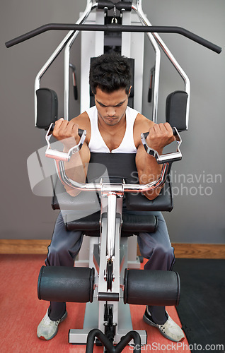 Image of Bench, weights and man with gym machine, workout and challenge with endurance and progress. Bodybuilder, person and guy in a health center, strong and exercise with strength training and fitness