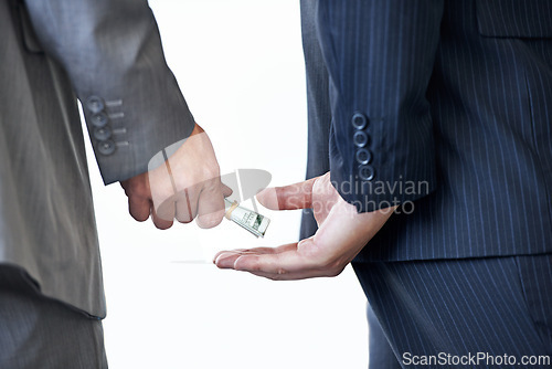 Image of Business people, hands and money for bribe and corruption in company with money laundering on white background. Illegal professional deal, cash or payment for crime with scam and fraud in finance