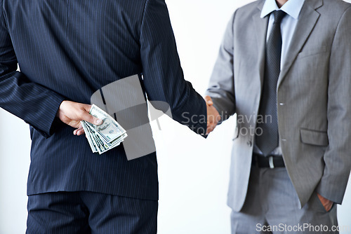 Image of Handshake, deal with corruption and business people in meeting, illegal partnership and fraud with money laundering. Agreement, collaboration and payment for crime with bribery on white background
