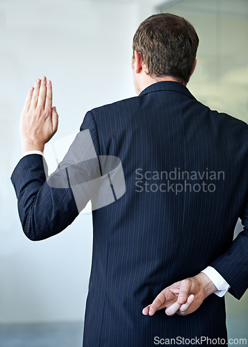 Image of Businessman, back and fingers crossed with luck of liar for hope, confidential or secret at office. Rear view of man or business employee hiding hand in conspiracy, lie or swear for truth or honesty