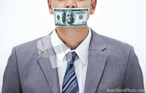 Image of Business man, money and mouth for silence, bribe or corruption with suit in studio by white background. Person, cash and quiet for corporate crime with fraud, finance or illegal payment at job in USA