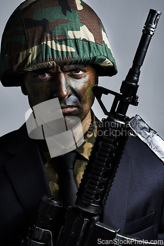 Image of Soldier, man and gun in portrait with camouflage face paint for conflict, war and suit for corporate crime. Person, rifle and helmet in military gear with anger for battle, challenge or human rights