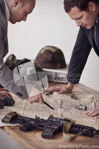 Image of Planning, map and men soldiers in military in discussion for war battlefield with guns. Teamwork, conversation and male army heros working on fighting strategy with paperwork for armed forces gear.