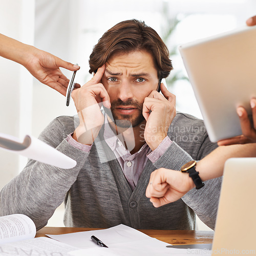 Image of Businessman, portrait and overworked with hands, chaos and frustrated in workplace for multitasking. Male person, headache and overworked with digital tech, documents and technology for deadline time