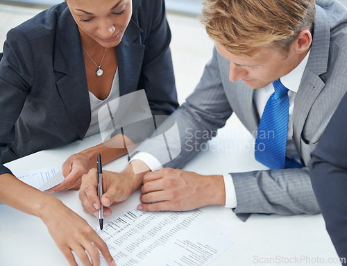 Image of Documents, teamwork and business people in a meeting, financial planning and brokers with deadline and schedule. Stats, group and paperwork with cooperation and accountant with paperwork and talking