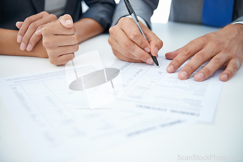 Image of Closeup, hands and business people with documents, finance or contract for b2b deal or onboarding. Brokers, manager or employee with paperwork or trading with stats or signing with economy or writing