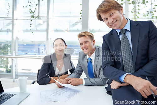 Image of Portrait, smile and business people in office with documents for meeting, planning or strategy, Collaboration, teamwork or partnership with corporate men and women in boardroom of workplace together