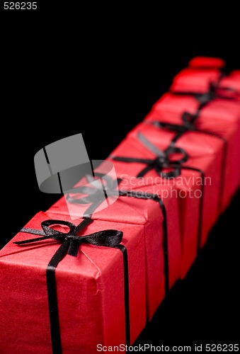 Image of red gift boxes on black