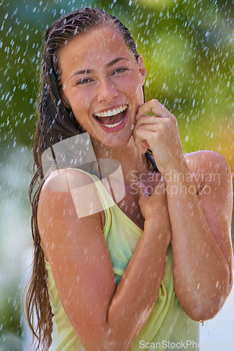 Image of Woman, rain and portrait with laughing from summer climate, water and weather outdoor in park. Happy, travel and female person with funny joke from raindrops on holiday and vacation with trip and joy