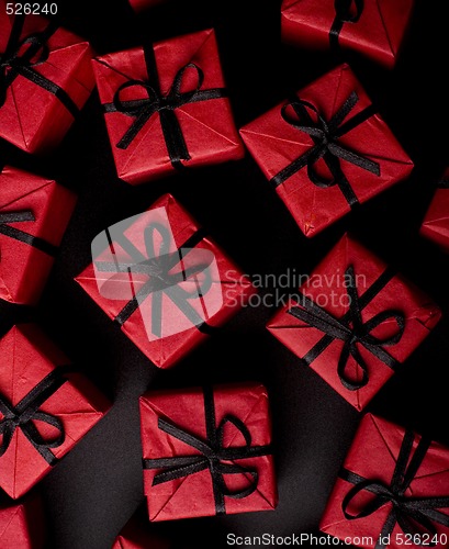 Image of red gift boxes on black