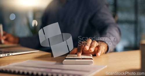 Image of Calculator, hands and business man with finance, tax and budget work in a office. Investment, accountant and savings plan consultant with computer and numbers for calculations and accounting report