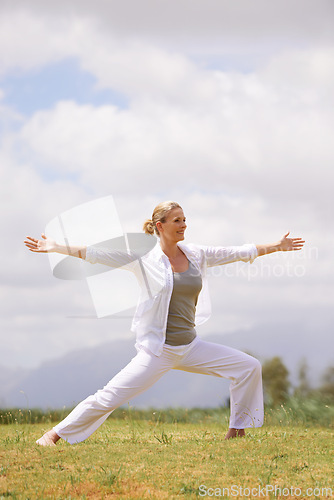 Image of Happy woman, yoga and pilates on field in nature for outdoor workout, exercise or health and wellness. Female person or yogi stretching body for zen, training or balance in wellbeing on green grass