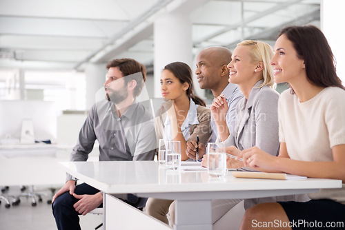 Image of Workshop, presentation and audience of business people in office for teamwork, collaboration and discussion. Corporate company, meeting and men and women listen for feedback, planning and report