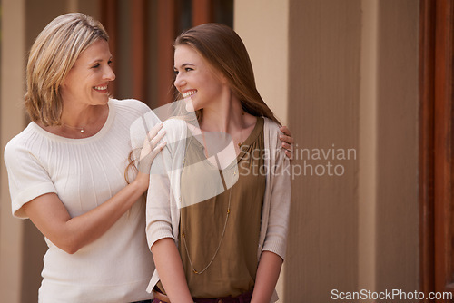 Image of Women, mother and daughter with conversation, support and happy for advice, bonding and care at house. People, girl and mature mom with talking, love or connection with smile at family home in France