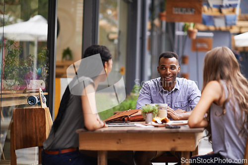 Image of Friends, relax with people at coffee shop and conversation for bonding, diversity and trust outdoor in San Francisco. Support, loyalty and friendship date at cafe for social gathering or reunion