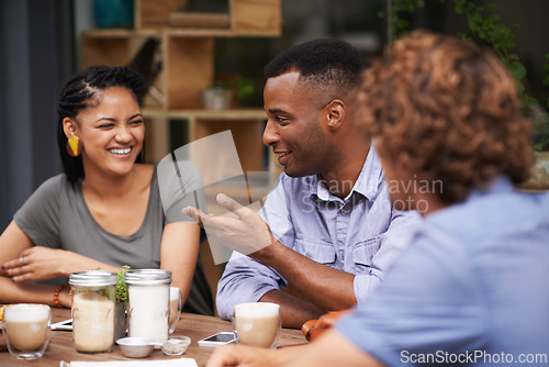 Image of Friends, people relax together at coffee shop and bonding with conversation, diversity and trust outdoor in San Francisco. Support, loyalty and friendship date at cafe for social gathering or reunion