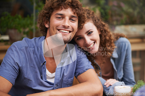 Image of Happy, love and portrait of couple at coffee shop on romantic, anniversary or morning date. Smile, positive and young man and woman bonding at cafeteria or restaurant for cappuccino together.